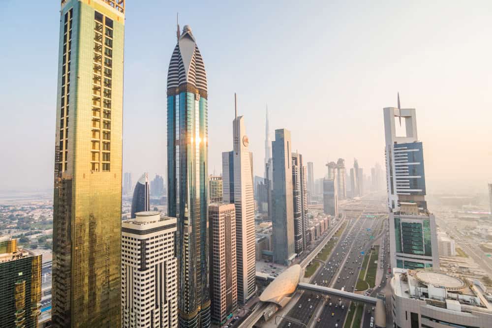 Elegant image of the Dubai skyline and skyscrapers bathed in sunset light